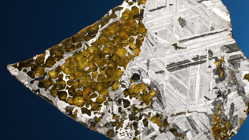 Illustration for article titled 30 Starry Wonders Hiding Inside of Dull Meteorites